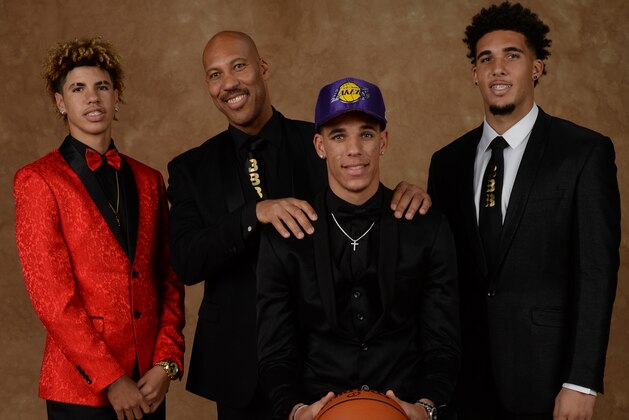 BROOKLYN, NY - JUNE 22:   LaVar Ball, LiMelo Ball and LiAngelo Ball pose for a portrait with Lonzo Ball after being drafted number two overall to the  Los Angeles Lakers during the 2017 NBA Draft on June 22, 2017 at Barclays Center in Brooklyn, New York. NOTE TO USER: User expressly acknowledges and agrees that, by downloading and or using this photograph, User is consenting to the terms and conditions of the Getty Images License Agreement. Mandatory Copyright Notice: Copyright 2017 NBAE (Photo by Jennifer Pottheiser/NBAE via Getty Images)