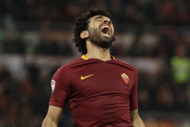 Roma's Mohamed Salah celebrates after scoring during a Serie A soccer match between Roma and Sassuolo, at the Olympic stadium in Rome, Sunday, March 19, 2017. (AP Photo/Andrew Medichini)