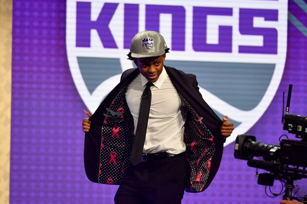 BROOKLYN, NY - JUNE 22: De'Aaron Fox shows off his jacket after being selected fifth overall by the Sacramento Kings in the 2017 NBA Draft on June 22, 2017 at Barclays Center in Brooklyn, New York. NOTE TO USER: User expressly acknowledges and agrees that, by downloading and or using this photograph, User is consenting to the terms and conditions of the Getty Images License Agreement. Mandatory Copyright Notice: Copyright 2017 NBAE (Photo by Jesse D. Garrabrant/NBAE via Getty Images) BROOKLYN, NY - JUNE 22: De'Aaron Fox shows off his jacket after being selected fifth overall by the Sacramento Kings in the 2017 NBA Draft on June 22, 2017 at Barclays Center in Brooklyn, New York. NOTE TO USER: User expressly acknowledges and agrees that, by downloading and or using this photograph, User is consenting to the terms and conditions of the Getty Images License Agreement. Mandatory Copyright Notice: Copyright 2017 NBAE (Photo by Jesse D. Garrabrant/NBAE via Getty Images)