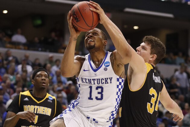 Kentucky's Isaiah Briscoe (13) heads to the basket as Northern Kentucky's Drew McDonald, right, and Jordan Garnett, left, defend during the first half of a first-round game in the men's NCAA college basketball tournament Friday, March 17, 2017, in Indianapolis. (AP Photo/Jeff Roberson) Kentucky's Isaiah Briscoe (13) heads to the basket as Northern Kentucky's Drew McDonald, right, and Jordan Garnett, left, defend during the first half of a first-round game in the men's NCAA college basketball tournament Friday, March 17, 2017, in Indianapolis. (AP Photo/Jeff Roberson)