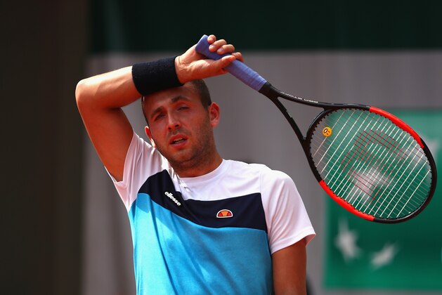 PARIS, FRANCE - MAY 28:  Daniel Evans of Great Britain reacts during the mens singles first round match against Tommy Robredo of Spain on day one of the 2017 French Open at Roland Garros on May 28, 2017 in Paris, France.  (Photo by Clive Brunskill/Getty Images)