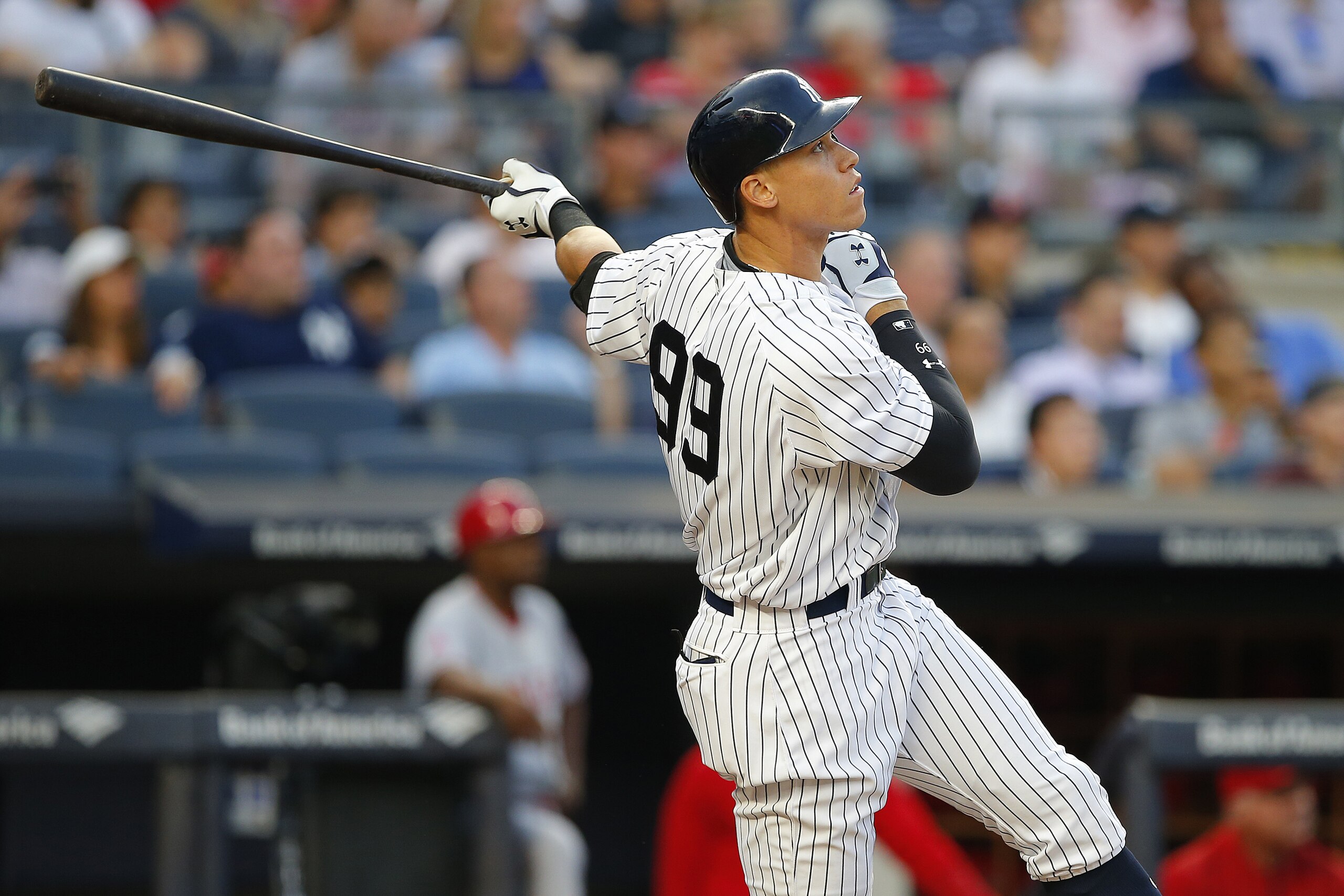 NEW YORK, NY - JUNE 22: Aaron Judge #99 of the New York Yankees hits a three-run home run against the Los Angeles Angels of Anaheim during the second inning of a game at Yankee Stadium on June 22, 2017 in New York City. (Photo by Rich Schultz/Getty Images)