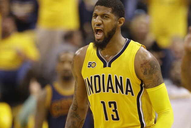 Indiana Pacers' Paul George reacts during the first half in Game 3 of a first-round NBA basketball playoff series against the Cleveland Cavaliers,Thursday, April 20, 2017, in Indianapolis. (AP Photo/Michael Conroy)