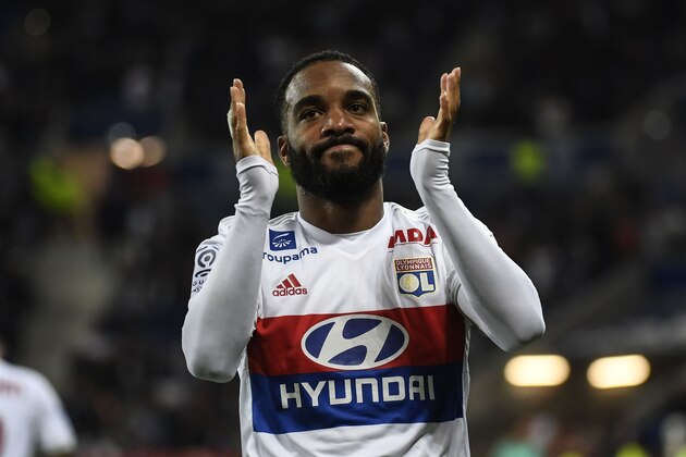 Lyon's French forward Alexandre Lacazette reacts after scoring during the French L1 football match between Lyon (OL) and Nice (OGCN) on May 20, 2017, at the Parc Olympique Lyonnais stadium in Decines-Charpieu near Lyon, central-eastern  France. / AFP PHOTO / PHILIPPE DESMAZES        (Photo credit should read PHILIPPE DESMAZES/AFP/Getty Images)