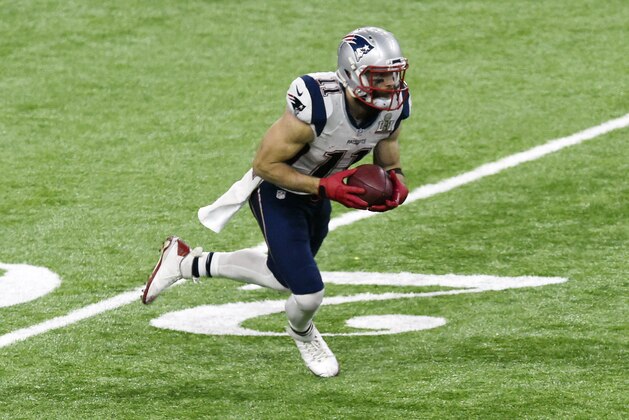 HOUSTON, TX - FEBRUARY 05: Julian Edelman #11 of the New England Patriots runs with the ball against the Atlanta Falcons during Super Bowl 51 at NRG Stadium on February 5, 2017 in Houston, Texas. The Patriots defeat the Atlanta Falcons 34-28 in overtime. (Photo by Focus on Sport/Getty Images)