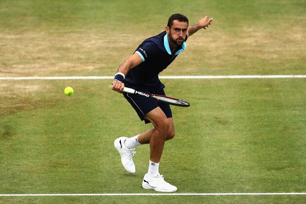 LONDON, ENGLAND - JUNE 24:  Marin Cilic of Croatia volleys during the mens singles semi-final match against Gilles Muller of Luxembourg on day six of the 2017 Aegon Championships at Queens Club on June 24, 2017 in London, England.  (Photo by Julian Finney/Getty Images)