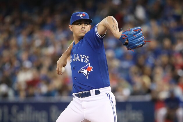 TORONTO, ON - MAY 27: Roberto Osuna #54 of the Toronto Blue Jays delivers a pitch in the ninth inning during MLB game action against the Texas Rangers at Rogers Centre on May 27, 2017 in Toronto, Canada. (Photo by Tom Szczerbowski/Getty Images)