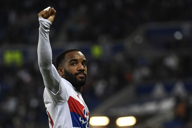 Lyon's French forward Alexandre Lacazette reacts after scoring a goal during the French L1 football match between Lyon (OL) and Nice (OGCN) on May 20, 2017, at the Parc Olympique Lyonnais stadium in Decines-Charpieu near Lyon, central-eastern  France. / AFP PHOTO / PHILIPPE DESMAZES        (Photo credit should read PHILIPPE DESMAZES/AFP/Getty Images)