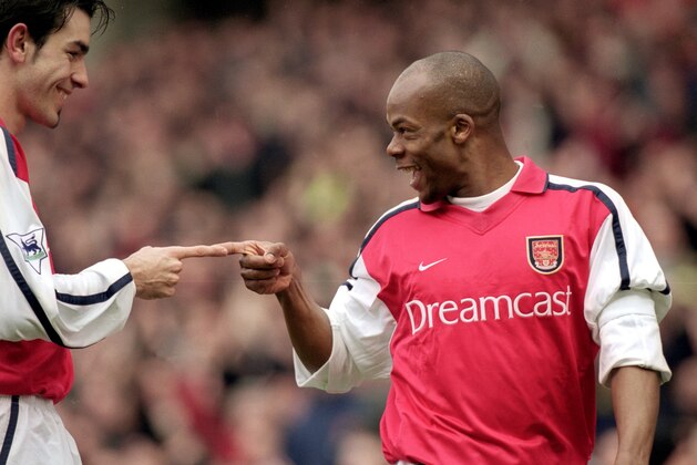 3 Mar 2001:  Sylvain Wiltord of Arsenal celebrates his goal against West Ham United with team mate Robert Pires during the FA Carling Premiership match at Highbury in London. Arsenal won 3-0. \ Picture by Steve Bardens \ Mandatory Credit: Allsport UK /Allsport