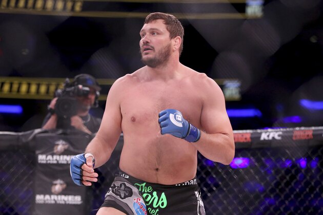 Matt Mitrione in action against Fedor Emelianenko in a mixed martial arts bout at Bellator 180 on Saturday, June 24, 2017, in New York. Mitrione won via first round stoppage. (AP Photo/Gregory Payan)