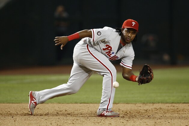 Philadelphia Phillies' Maikel Franco fields a grounder during the seventh inning of a baseball game against the Arizona Diamondbacks Saturday, June 24, 2017, in Phoenix. The Diamondbacks defeated the Phillies 9-2. (AP Photo/Ross D. Franklin)