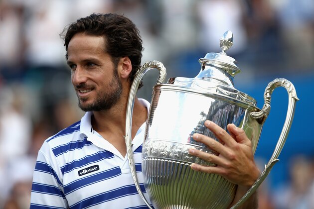 LONDON, ENGLAND - JUNE 25:  Feliciano Lopez of Spain celebrates with the winners trophy following victory in the mens singles final against Marin Cilic of Croatia during day seven of the 2017 Aegon Championships at Queens Club on June 25, 2017 in London, England.  (Photo by Julian Finney/Getty Images)