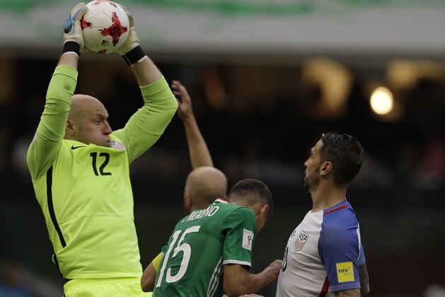 United States goalkeeper Brad Guzan catches the ball during a World Cup soccer qualifying match at Azteca Stadium between the U.S. and Mexico in Mexico City, Sunday, June 11, 2017.(AP Photo/Rebecca Blackwell)