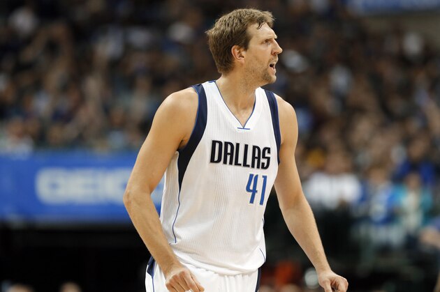 Dallas Mavericks forward Dirk Nowitzki (41) of Germany shouts in the direction of an official as he jogs up court during an NBA basketball game against the Golden State Warriors on Tuesday, March 21, 2017, in Dallas. (AP Photo/Tony Gutierrez)
