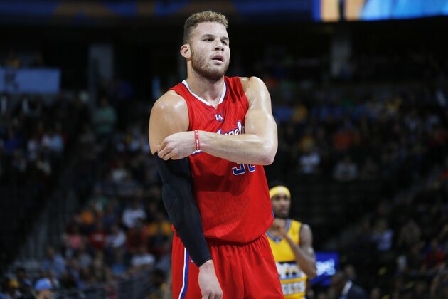 Los Angeles Clippers forward Blake Griffin (32) prepares to shoot free throws against the Denver Nuggets in the first quarter of an NBA basketball game Saturday, April 4, 2015, in Denver. (AP Photo/David Zalubowski)