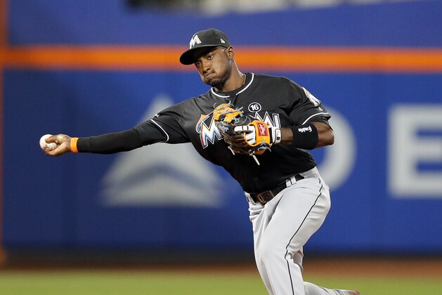 NEW YORK, NY - May 6:  Adeiny Hechavarria #3 of the Miami Marlins throws to first base after fielding a grounder in an MLB baseball game against the New York Mets on May 6, 2017 at CitiField in the Queens borough of New York City. (Photo by Paul Bereswill/Getty Images)