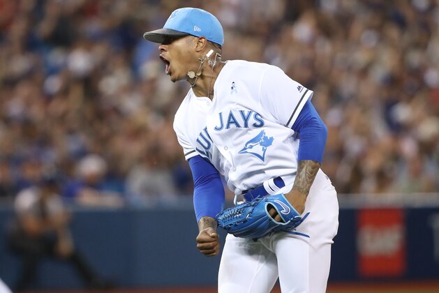TORONTO, ON - JUNE 17: Marcus Stroman #6 of the Toronto Blue Jays celebrates after getting a double play to end the fifth inning during MLB game action against the Chicago White Sox at Rogers Centre on June 17, 2017 in Toronto, Canada. (Photo by Tom Szczerbowski/Getty Images)