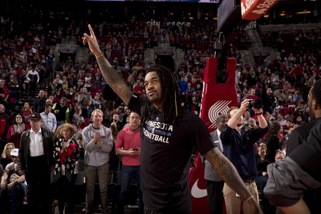 PORTLAND, OR - MARCH 25: Jordan Hill #27 of the Minnesota Timberwolves waves to the crowd before the game against the Portland Trail Blazers on March 25, 2017 at the Moda Center in Portland, Oregon. NOTE TO USER: User expressly acknowledges and agrees that, by downloading and or using this Photograph, user is consenting to the terms and conditions of the Getty Images License Agreement. Mandatory Copyright Notice: Copyright 2017 NBAE (Photo by Cameron Browne/NBAE via Getty Images)