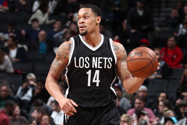 BROOKLYN, NY - MARCH 21: K.J. McDaniels #14 of the Brooklyn Nets handles the ball against the Detroit Pistons on March 21, 2017 at Barclays Center in Brooklyn, New York. NOTE TO USER: User expressly acknowledges and agrees that, by downloading and or using this Photograph, user is consenting to the terms and conditions of the Getty Images License Agreement. Mandatory Copyright Notice: Copyright 2017 NBAE (Photo by Nathaniel S. Butler/NBAE via Getty Images)