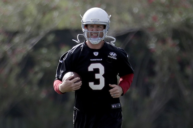 Arizona Cardinals NFL football quarterback Carson Palmer (3) runs drills during a voluntary team workout, Tuesday, May 16, 2017, in Tempe, Ariz. The Arizona Cardinals have five quarterbacks on their roster. One big reason is a concerted effort to prevent Carson Palmer from doing much of anything in the offseason to preserve the arm strength of the 37-year-old quarterback. (AP Photo/Matt York)