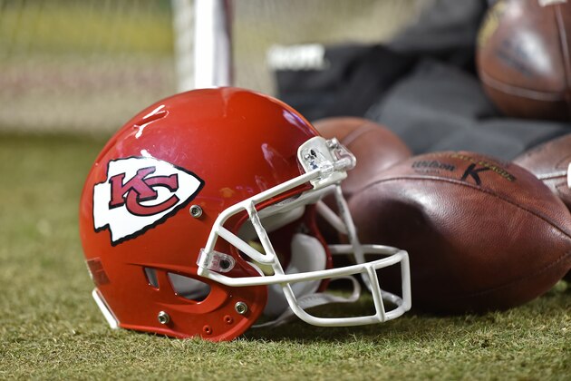 KANSAS CITY, MO - SEPTEMBER 17:  A general view of Kansas City Chiefs helmet and a footballs on the sidelines during a game against the Denver Broncos at Arrowhead Stadium on September 17, 2015 in Kansas City, Missouri.  (Photo by Peter G. Aiken/Getty Images)