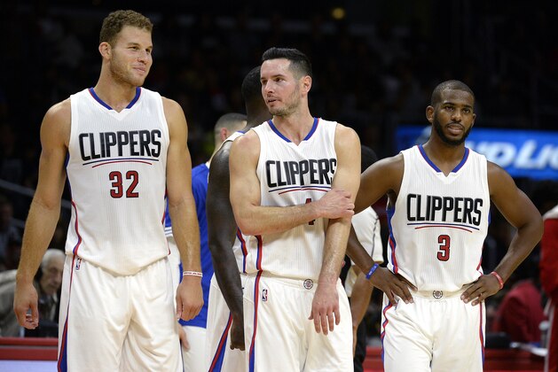 LOS ANGELES CA - OCTOBER 22: Blake Griffin #32, J.J. Redick #4 and Chris Paul #3 of the Los Angeles Clippers during the second quarter of their preseason basketball game against Portland Trail Blazers at Staples Center October 22, 2015 in Los Angeles, California. NOTE TO USER: User expressly acknowledges and agrees that, by downloading and or using this Photograph, user is consenting to the terms and condition of the Getty Images License Agreement. (Photo by Kevork Djansezian/Getty Images)