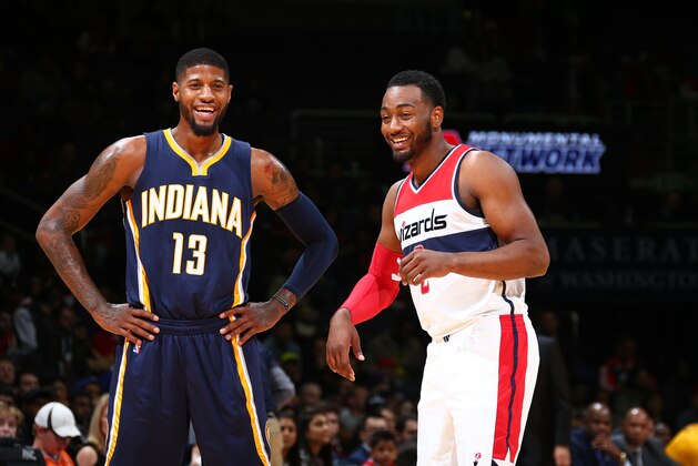 WASHINGTON, DC -  NOVEMBER 24:  Paul George #13 of the Indiana Pacers and John Wall #2 of the Washington Wizards share a laugh during the game on November 24, 2015 at Verizon Center in Washington, DC. NOTE TO USER: User expressly acknowledges and agrees that, by downloading and or using this Photograph, user is consenting to the terms and conditions of the Getty Images License Agreement. Mandatory Copyright Notice: Copyright 2015 NBAE (Photo by Ned Dishman/NBAE via Getty Images)