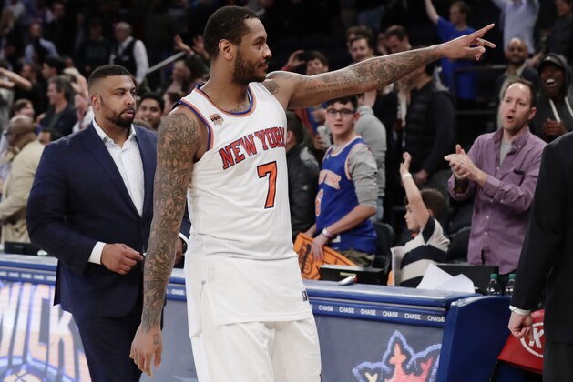 New York Knicks' Carmelo Anthony (7) gestures to fans after an NBA basketball game against the Philadelphia 76ers Wednesday, April 12, 2017, in New York. The Knicks won 114-113. (AP Photo/Frank Franklin II)
