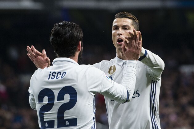 MADRID, SPAIN - MARCH 01: Isco Alarcon of Real Madrid celebrates with Cristiano Ronaldo after scoring during their La Liga match between Real Madrid vs Las Palmas at the Santiago Bernabeu Stadium on 01 March 2017 in Madrid, Spain. (Photo by Power Sport Images/Getty Images) MADRID, SPAIN - MARCH 01: Isco Alarcon of Real Madrid celebrates with Cristiano Ronaldo after scoring during their La Liga match between Real Madrid vs Las Palmas at the Santiago Bernabeu Stadium on 01 March 2017 in Madrid, Spain. (Photo by Power Sport Images/Getty Images)