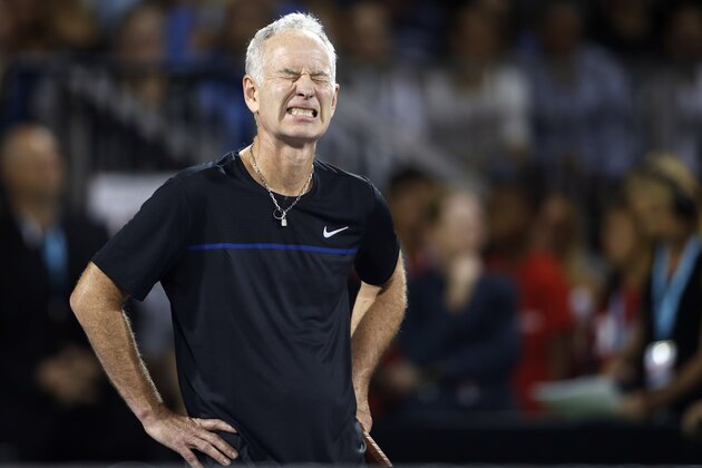 John McEnroe reacts after a point during a World Team Tennis exhibition to benefit the Elton John AIDS Foundation on Monday, Oct. 10, 2016, in Las Vegas. (AP Photo/Isaac Brekken)