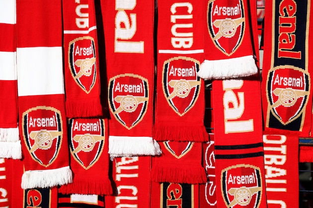 LONDON, ENGLAND - NOVEMBER 06:  Scarves are displayed for sale at a stall outside the stadium before the Premier League match between Arsenal and Tottenham Hotspur at Emirates Stadium on November 6, 2016 in London, England.  (Photo by Clive Rose/Getty Images)