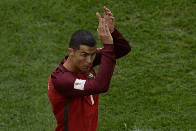 Portugal's forward Cristiano Ronaldo gestures as he leaves the pitch after being substituted during the 2017 Confederations Cup group A football match between New Zealand and Portugal at the Saint Petersburg Stadium in Saint Petersburg on June 24, 2017. / AFP PHOTO / Olga MALTSEVA        (Photo credit should read OLGA MALTSEVA/AFP/Getty Images)