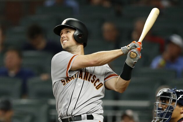 ATLANTA, GA - JUNE 22:  First baseman Buster Posey #28 of the San Francisco Giants hits a 2-run double in the third inning during the game against the Atlanta Braves at SunTrust Park on June 22, 2017 in Atlanta, Georgia.  (Photo by Mike Zarrilli/Getty Images)