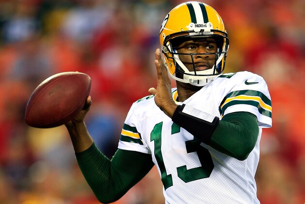 KANSAS CITY, MO - AUGUST 29:  Quarterback Vince Young #13 of the Green Bay Packers passes during the preseason game against the Kansas City Chiefs on at Arrowhead Stadium on August 29, 2013 in Kansas City, Missouri.  (Photo by Jamie Squire/Getty Images)