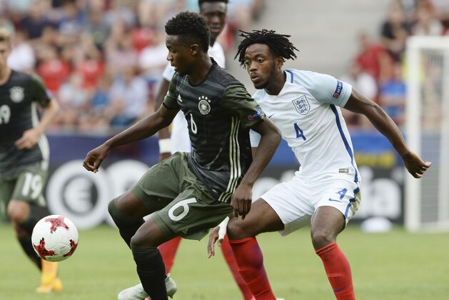 Germany's Gideon Jung, left, and England's Nathaniel Chalobah challenge for the ball during the Euro Under 21 semifinal soccer match between England and Germany in Tychy, Poland, Tuesday, June 27, 2017. (AP Photo/Alik Keplicz)