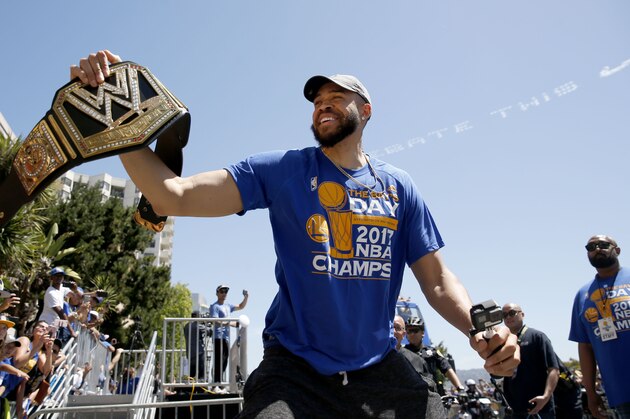 Jun 15, 2017; Oakland, CA, USA; Golden State Warriors center JaVale McGee holds a wrestling belt during the Warriors 2017 championship victory parade in downtown Oakland. Mandatory Credit: Cary Edmondson-USA TODAY Sports