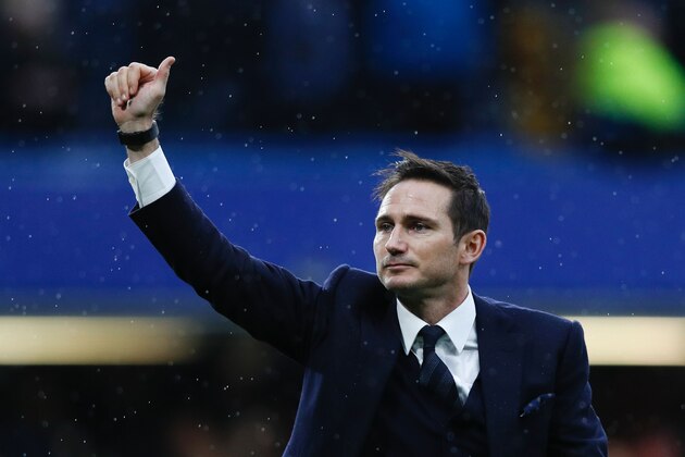 Chelsea and England former football player Frank Lampard gestures to the fans on the pitch at half-time during the English Premier League football match between Chelsea and Swansea at Stamford Bridge in London on February 25, 2017. / AFP / Adrian DENNIS / RESTRICTED TO EDITORIAL USE. No use with unauthorized audio, video, data, fixture lists, club/league logos or 'live' services. Online in-match use limited to 75 images, no video emulation. No use in betting, games or single club/league/player publications.  /         (Photo credit should read ADRIAN DENNIS/AFP/Getty Images)