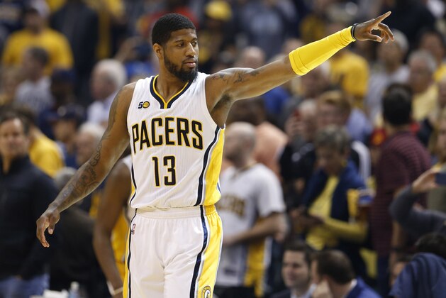 Apr 23, 2017; Indianapolis, IN, USA; Indiana Pacers forward Paul George (13) points during a game against the Cleveland Cavaliers in game four of the first round of the 2017 NBA Playoffs at Bankers Life Fieldhouse. Cleveland defeats Indiana 106-102. Mandatory Credit: Brian Spurlock-USA TODAY Sports