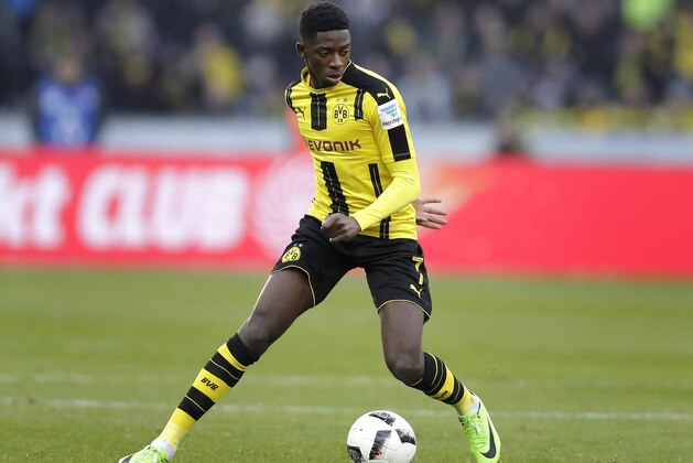 Dortmund's Ousmane Dembele plays the ball during the German Bundesliga soccer match between Hertha BSC Berlin and Borussia Dortmund in Berlin, Germany, Saturday, March 11, 2017. Berlin defeated Dortmund by 2-1. (AP Photo/Michael Sohn)