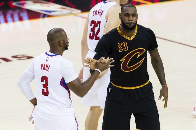 CLEVELAND, OH - DECEMBER 01: Chris Paul #3 of the LA Clippers and LeBron James #23 of the Cleveland Cavaliers greet each other during the first half at Quicken Loans Arena on December 1, 2016 in Cleveland, Ohio. The Clippers defeated the Cavaliers 113-94. NOTE TO USER: User expressly acknowledges and agrees that, by downloading and/or using this photograph, user is consenting to the terms and conditions of the Getty Images License Agreement. Mandatory copyright notice. (Photo by Jason Miller/Getty Images)