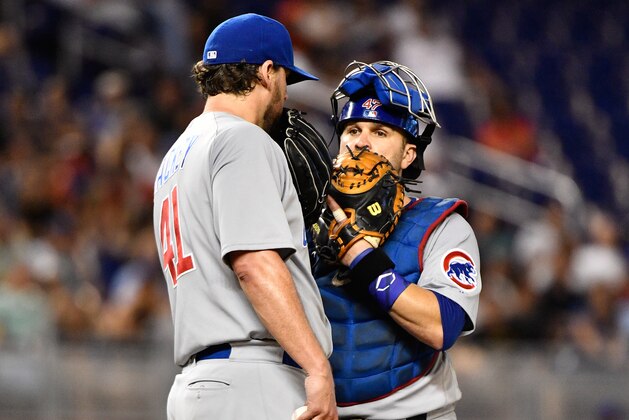 MIAMI, FL - JUNE 23: John Lackey #41 and Miguel Montero #47 of the Chicago Cubs in action during the game between the Miami Marlins and the Chicago Cubs at Marlins Park on June 23, 2017 in Miami, Florida. (Photo by Mark Brown/Getty Images)