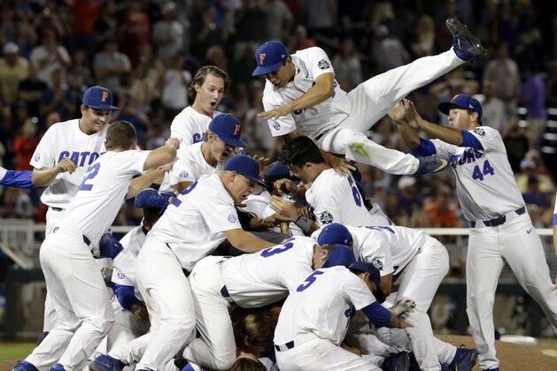 Florida players celebrate after defeating LSU in Game 2 to win the NCAA College World Series baseball finals in Omaha, Neb., Tuesday, June 27, 2017. (AP Photo/Nati Harnik)