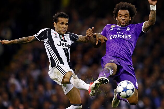 (L-R) Dani Alves of Juventus, Marcelo of Real Madridduring the UEFA Champions League final match between Juventus FC and Real Madrid on June 3, 2017 at the Millennium Stadium in Cardiff, Wales(Photo by VI Images via Getty Images)