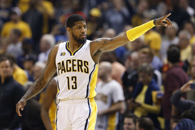 Apr 23, 2017; Indianapolis, IN, USA; Indiana Pacers forward Paul George (13) points during a game against the Cleveland Cavaliers in game four of the first round of the 2017 NBA Playoffs at Bankers Life Fieldhouse. Cleveland defeats Indiana 106-102. Mandatory Credit: Brian Spurlock-USA TODAY Sports