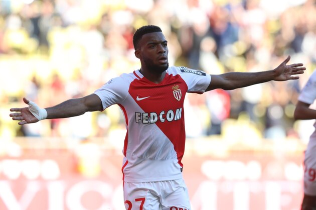 Monaco's French midfielder Thomas Lemar celebrates after scoring a goal during the French L1 football match Monaco (ASM) vs Toulouse (TFC) on April 29, 2017 at the 'Louis II Stadium' in Monaco.   / AFP PHOTO / VALERY HACHE        (Photo credit should read VALERY HACHE/AFP/Getty Images)