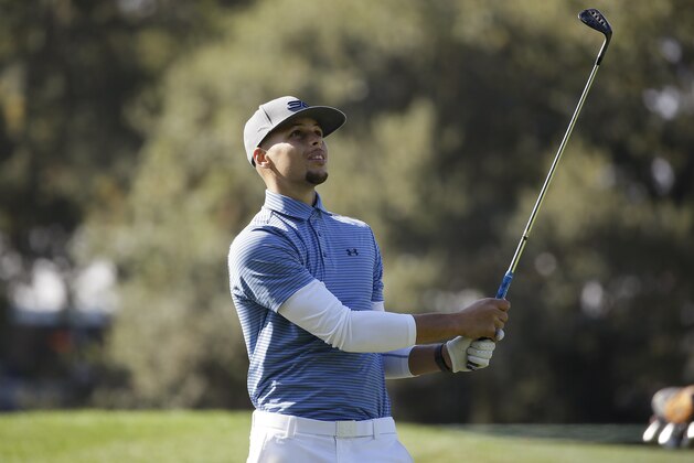 Golden State Warriors' Stephen Curry follows his shot from the 14th fairway of the Silverado Resort North Course during the pro-am event of the Safeway Open PGA golf tournament Wednesday, Oct. 12, 2016, in Napa, Calif. (AP Photo/Eric Risberg)
