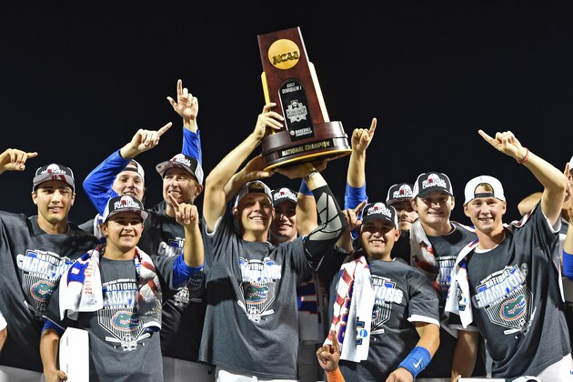 OMAHA, NE - JUNE 27:  Players of the Florida Gators hold up the National Championship Trophy after defeating the LSU Tigers 6-1  at the College World Series on June 27, 2017 at TD Ameritrade Park in Omaha, Nebraska.  (Photo by Peter Aiken/Getty Images)