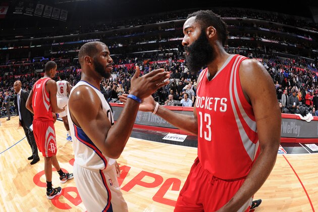 LOS ANGELES, CA - JANUARY 18: Chris Paul #3 of the Los Angeles Clippers high fives James Harden #13 of the Houston Rockets during the game on January 18, 2016 at STAPLES Center in Los Angeles, California. NOTE TO USER: User expressly acknowledges and agrees that, by downloading and or using this Photograph, user is consenting to the terms and conditions of the Getty Images License Agreement. Mandatory Copyright Notice: Copyright 2016 NBAE (Photo by Andrew Bernstein/NBAE via Getty Images)