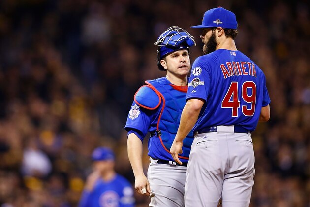 PITTSBURGH, PA - OCTOBER 07:  Jake Arrieta #49 of the Chicago Cubs talks with Miguel Montero #47 of the Chicago Cubs on the pitcher's mound in the sixth inning during the National League Wild Card game against the Pittsburgh Pirates at PNC Park on October 7, 2015 in Pittsburgh, Pennsylvania.  (Photo by Jared Wickerham/Getty Images)