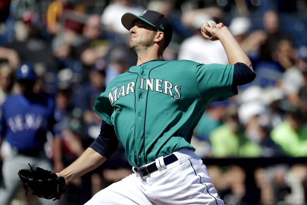 FILE - In this March 6, 2017, file photo, Seattle Mariners starting pitcher Drew Smyly throws against the Texas Rangers during the first inning of a spring training baseball game in Peoria, Ariz. Smyly will begin the season on the disabled list and could be out up to two months because of a strained left elbow. General manager Jerry Dipoto said Friday, March 31, 2017, that Smyly likely will miss six to eight week. He will rehab the injury and surgery is not expected, but he likely will get a second opinion. (AP Photo/Matt York, File(